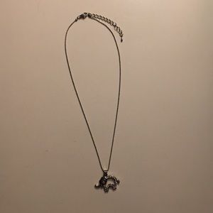 A cute elephant necklace.